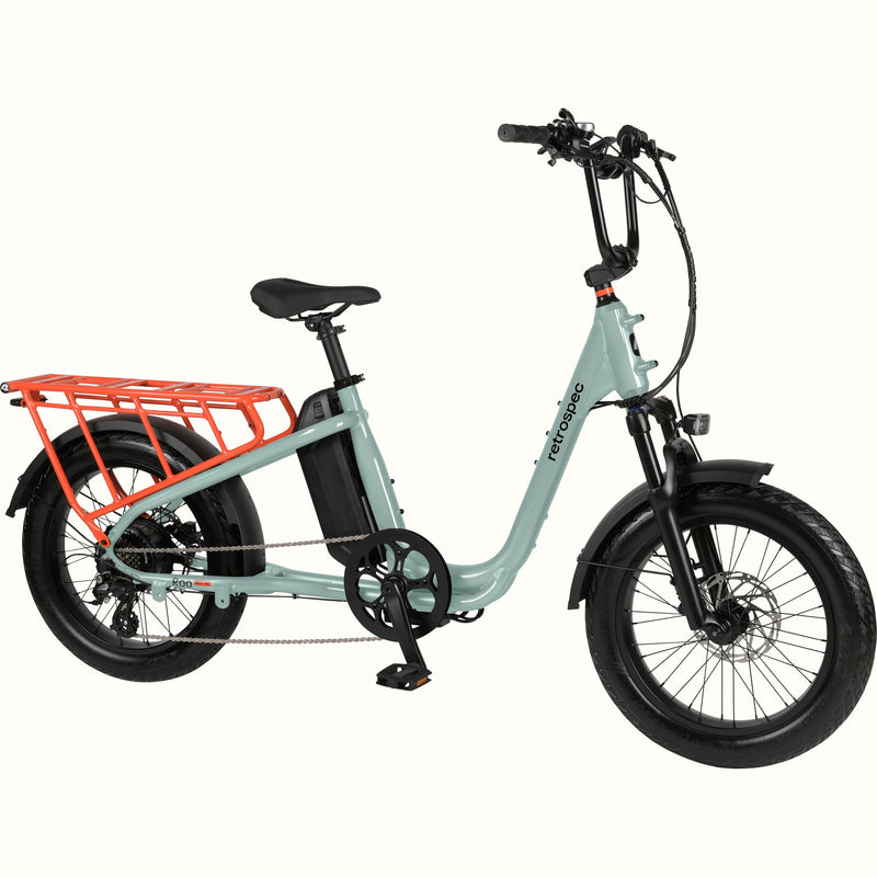 Mint Roo Rev XL electric cargo bike with an orange rear rack on a white background.