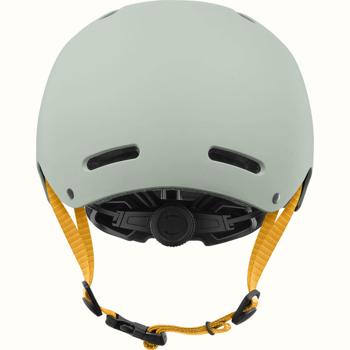 Back of the retrospec Dakota kids skateboard helmet showing rear vents and a black dial fit adjustment system.