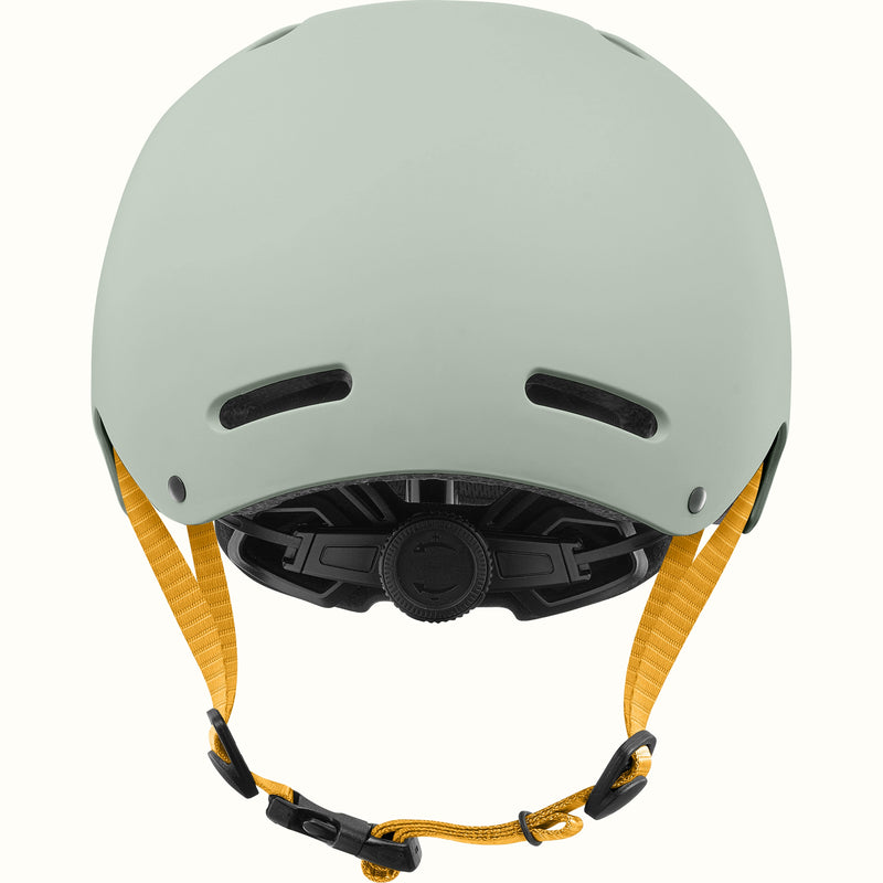Back of the retrospec Dakota kids skateboard helmet showing rear vents and a black dial fit adjustment system.