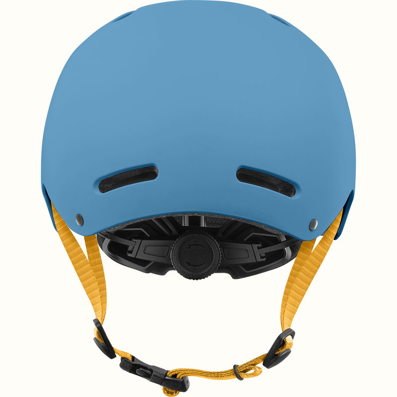 Rear view of the retrospec Dakota kids helmet in matte blue with two back vents, yellow straps, and a black fit dial.
