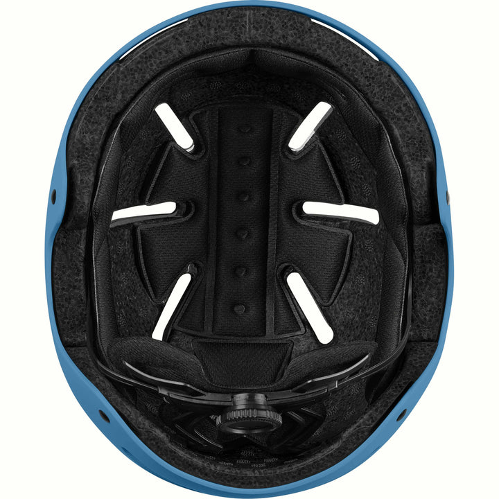 Interior of the retrospec Dakota youth helmet showing a black padded liner, vent channels, and fit dial in a blue shell.