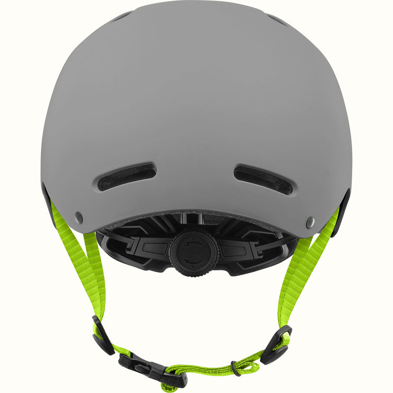 Rear view of the retrospec Dakota kids helmet in matte gray with two back vents, lime green straps, and a black fit dial.