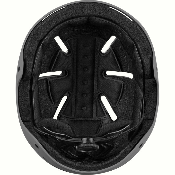 Interior of the retrospec Dakota youth helmet showing a black padded liner, vent channels, and fit dial in a gray shell.