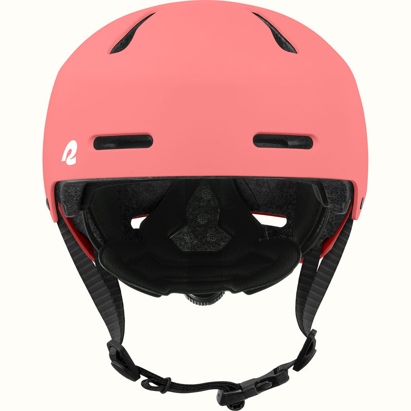 retrospec Dakota youth bike helmet in coral pink, front view with two forehead vents, black liner, and chin buckle.