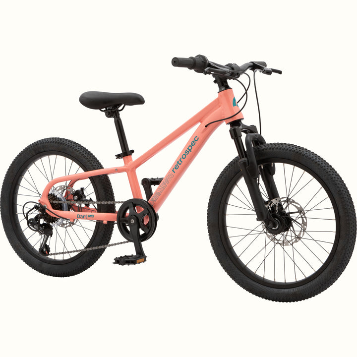 The Dart Plus 20" Kids' Bike in Fairy Floss Salmon color with blue-gray branded "retrospec" and "Dart Plus" logos on the frame, and thick black tires isolated on a white background.