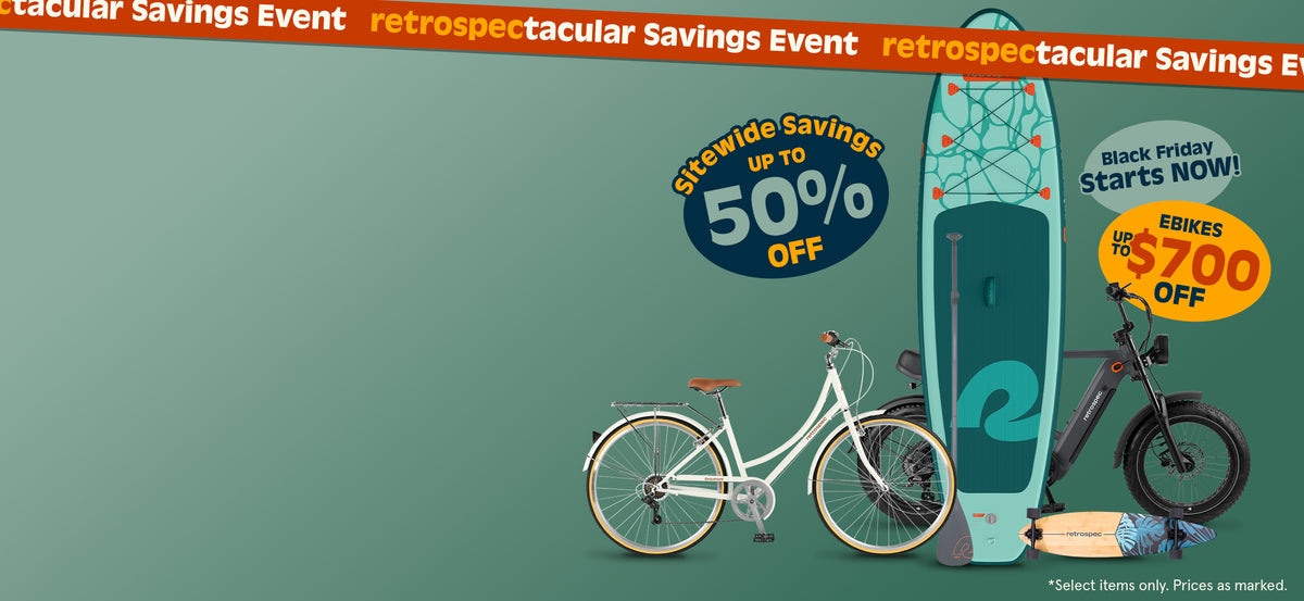 retrospec Black Friday Electric Bike sale with a fat tire model, Beaumont city bike, teal Paddle Board, and longboard.
