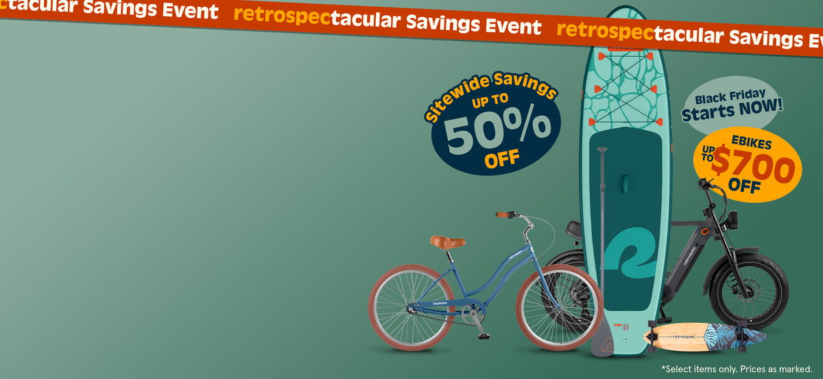 retrospec Black Friday Electric Bike sale with a fat tire model, Chatham cruiser bike, teal Paddle Board, and longboard.