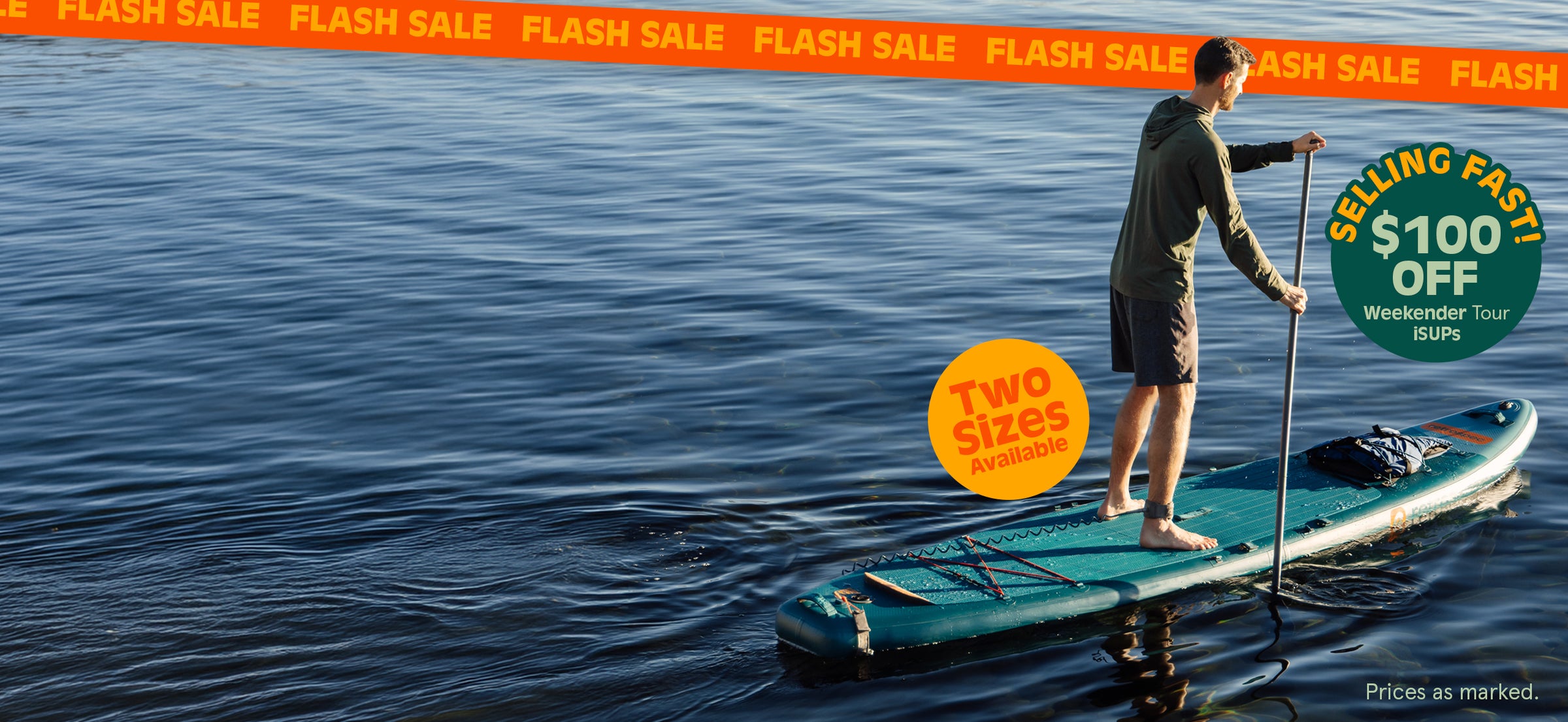 Man paddleboarding on calm water, with promotional text for a flash sale and $100 off Weekender Tour iSUPs.