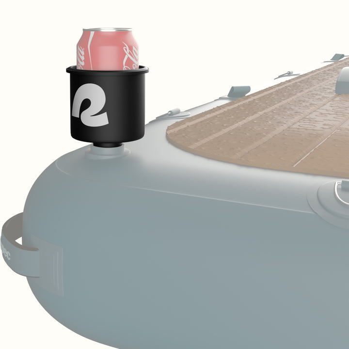 Black cup holder attached to an inflatable dock against a white background.