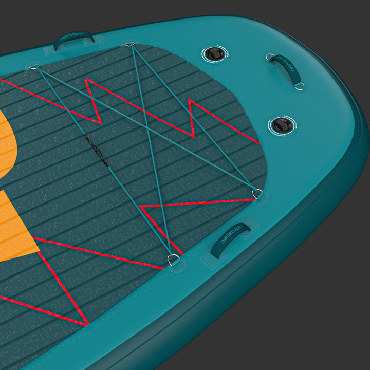 A close up of the Grateful Dead Weekender Crew XL Multi-Person Inflatable Stand Up Paddle Board 15’ with bungee for storage and a textured deck for grip.