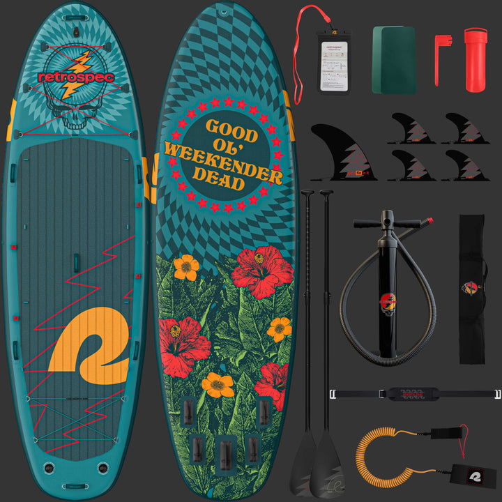 A front and rear view of the Grateful Dead Weekender Crew Multi-Person Inflatable Stand Up Paddle Board with "Good Ol' Weekender Dead," a "Steal Your Face" icon and flower designs, accompanied by two paddles and a black carrying bag with the "Steal Your Face" artwork and "retrospec" branding, along with the included accessories such as, cell phone case, patches, repair kit, fins, paddles, floor pump, leash, and carry strap.