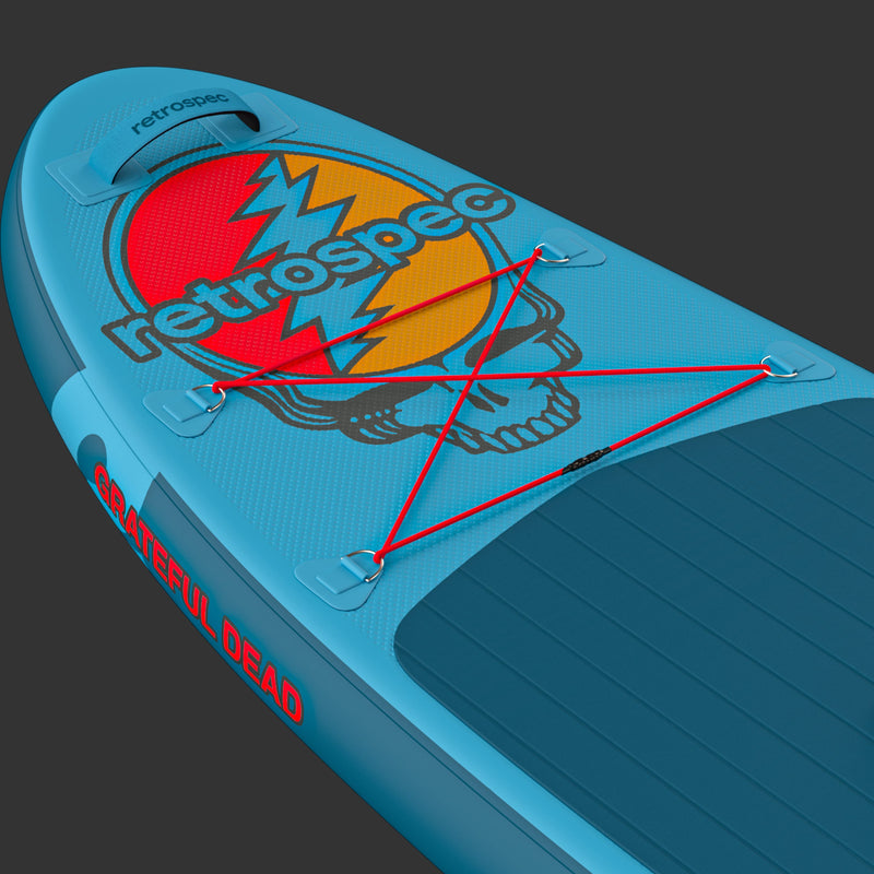 The vibrant Grateful Dead Weekender Nano Kids' Inflatable Paddle Board featuring the Grateful Dead Steal Your Face iconic artwork, with red bungee cords and a textured surface for grip.