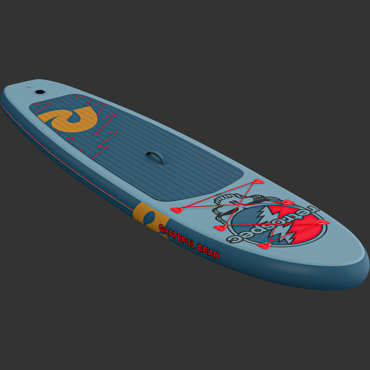 A vibrant blue Grateful Dead Weekender Inflatable Paddle Board featuring iconic Grateful Dead artwork, including "Steal Your Face", a lightning bolt and a large "retrospec" logo, set against a dark background.