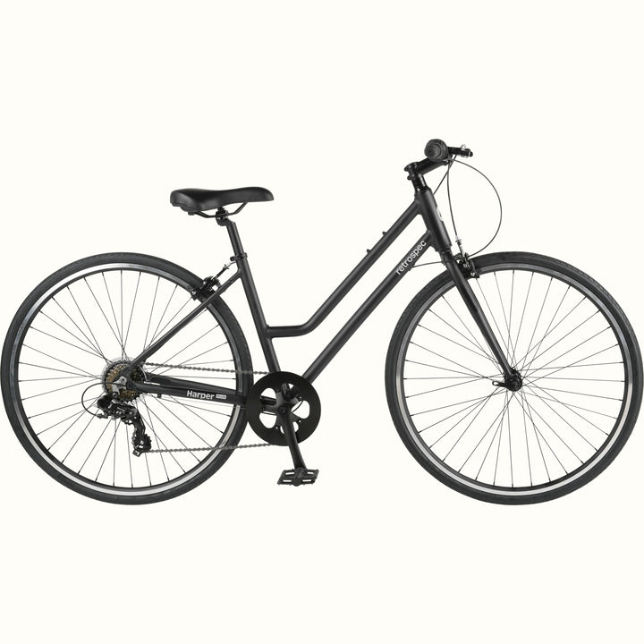 A matte black retrospec Harper Plus 7-Speed Step Through city bicycle on a white background.