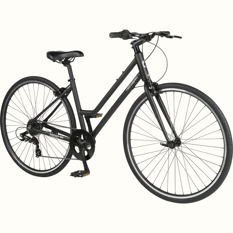 A matte black retrospec Harper Plus 7-Speed Step Through city bicycle on a white background.