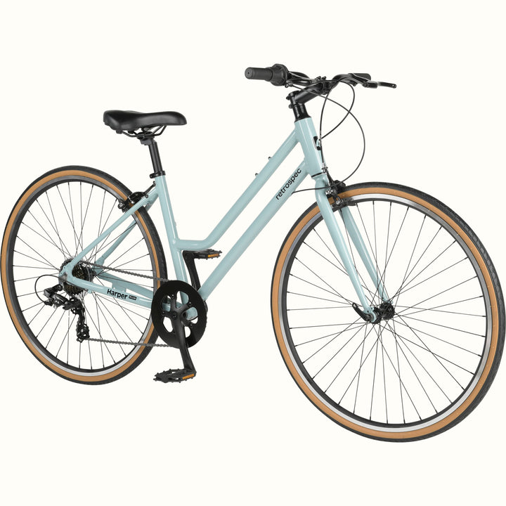 A light blue retrospec Harper Plus 7-Speed Step Through city bicycle with a black seat and handlebars.