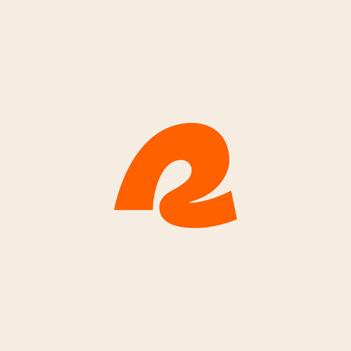 An orange retrospec logo on a beige background.