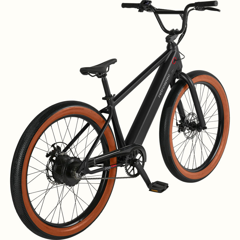 Black Joe Rev 2 BMX electric bicycle with brown tires on a white background.