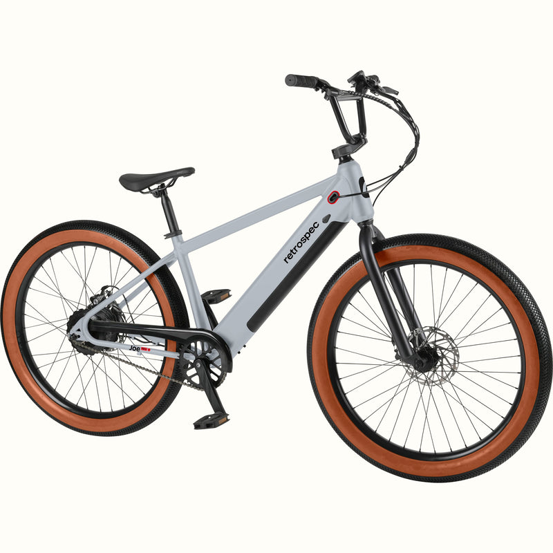 Gray Joe Rev 2 BMX electric bicycle with brown tires on a white background.