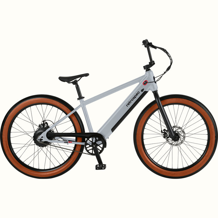 Gray Joe Rev 2 BMX electric bicycle with brown tires on a white background.