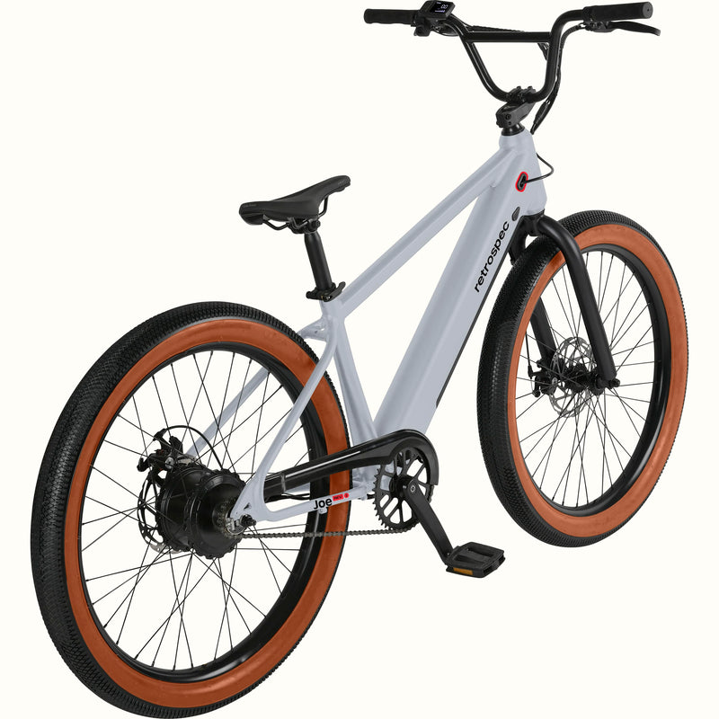 Gray Joe Rev 2 BMX electric bicycle with brown tires on a white background.