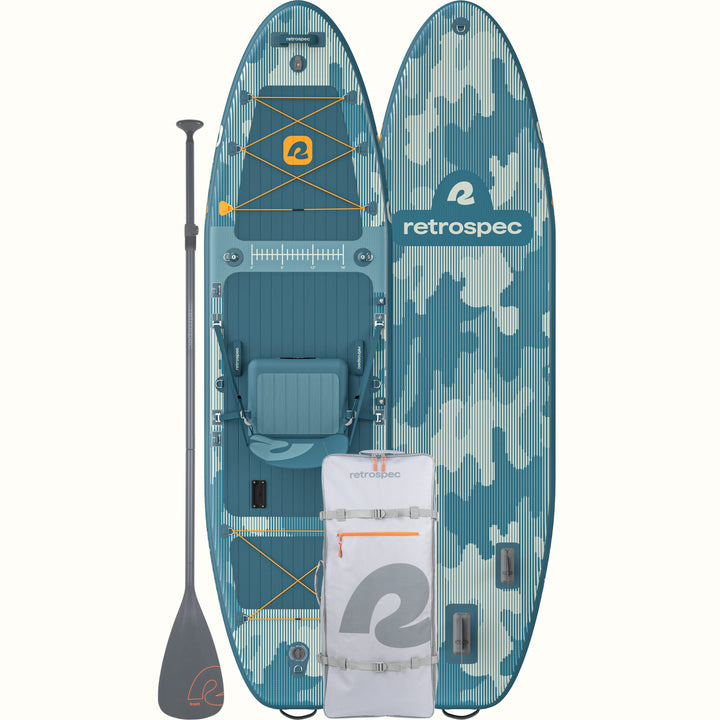 An aerial view of the front and rear of a blue and white camo June Nano Kids’ Inflatable Fishing Paddle Board/Kayak Hybrid 9'6", with a seat, paddle, and backpack, all branded with the retrospec logo.