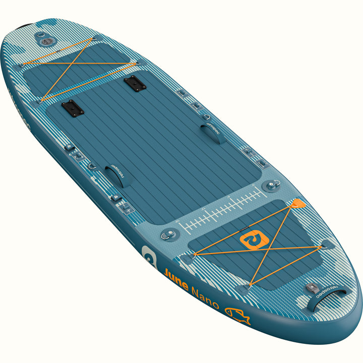 A blue and white camo June Nano Kids’ Inflatable Fishing Paddle Board/Kayak Hybrid with the seat removed, showcasing the storage straps, and measurement guide, designed for fishing.