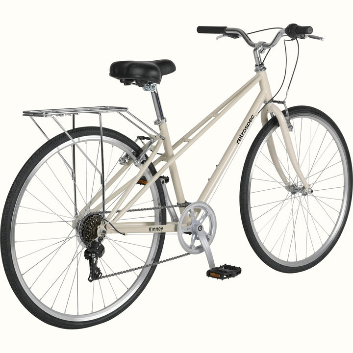 White Kinney Mixte City Bike - 7 Speed with black wheels and seat on a white background.
