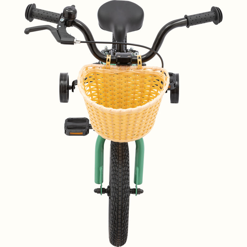 A bicycle with training wheels and a woven basket, viewed from the front.