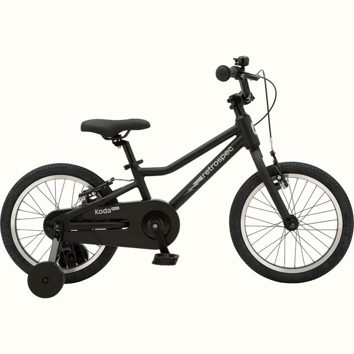 Kids' Koda Plus 16 Inch matte black bike with training wheels isolated on a white background.