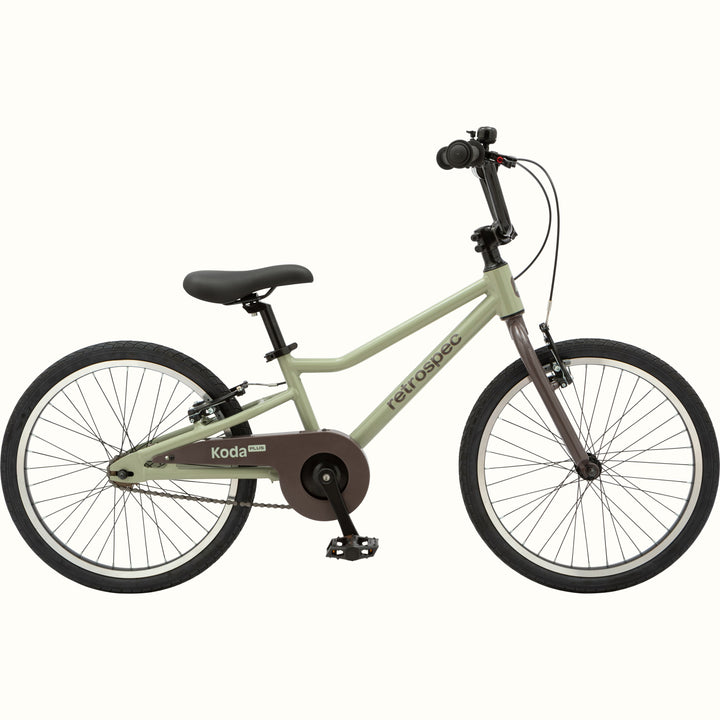 A sage green Koda Plus 20" Kids' Bike with brown chain guard and black wheels.