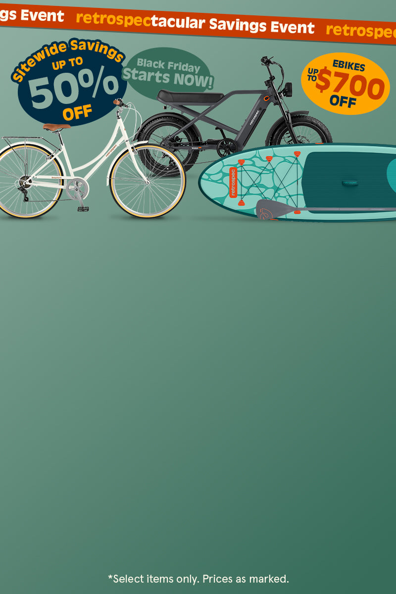 retrospec Black Friday Electric Bike sale with a fat tire model, Chatham cruiser bike, teal Paddle Board, and longboard.