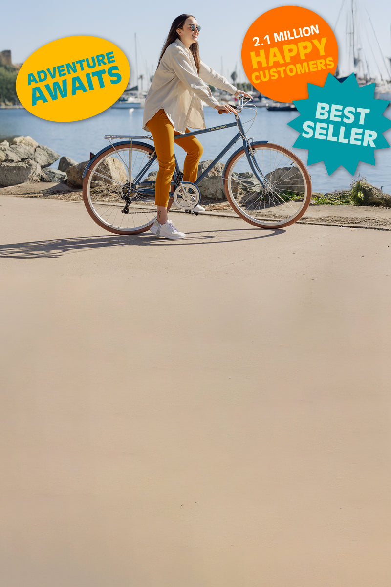 A person on a bicycle by a scenic river, surrounded by rocks and historical buildings, with promotional text about adventures and happy customers.