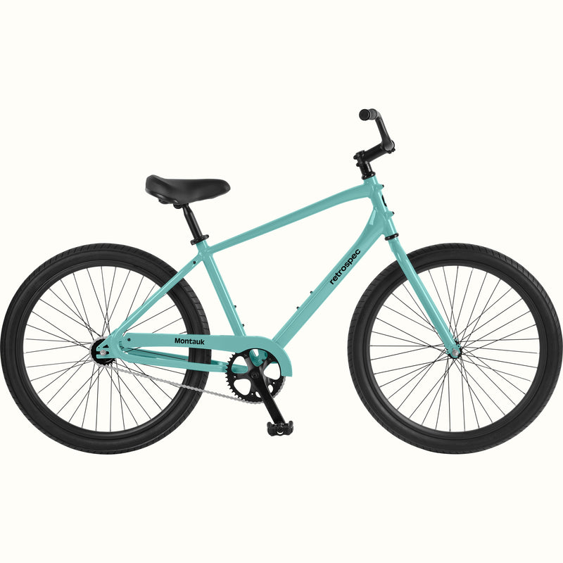retrospec Montauk 26-inch cruiser bike in seafoam with black tires, saddle, and upright handlebars, shown on a clean white background.