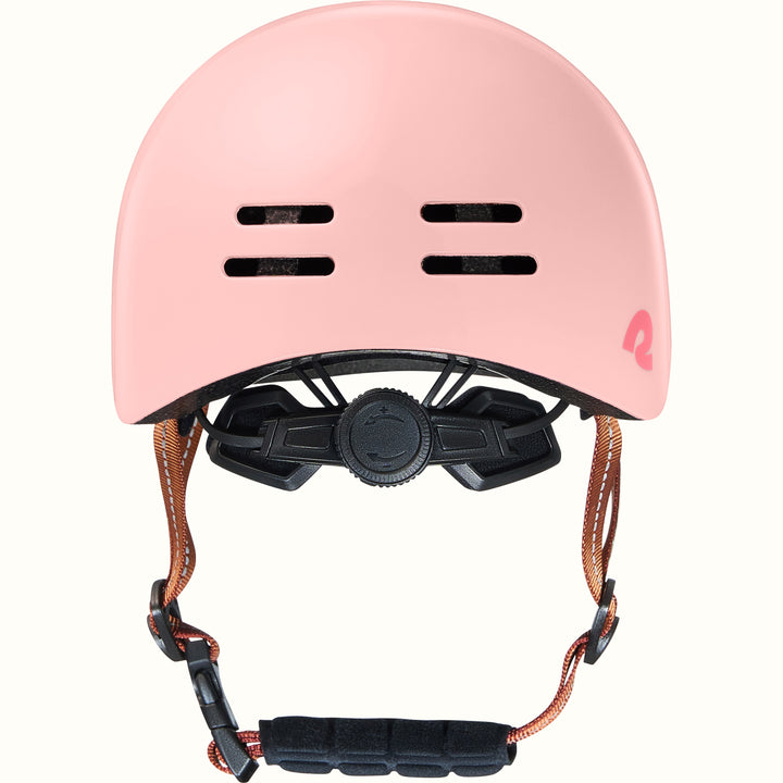 Pink toddler bike helmet with a brown strap on a white background.