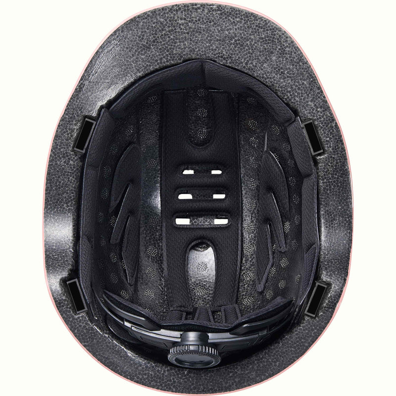 Close-up of the black interior of the Remi Toddler Bike Helmet revealing padding and an adjustable dial.