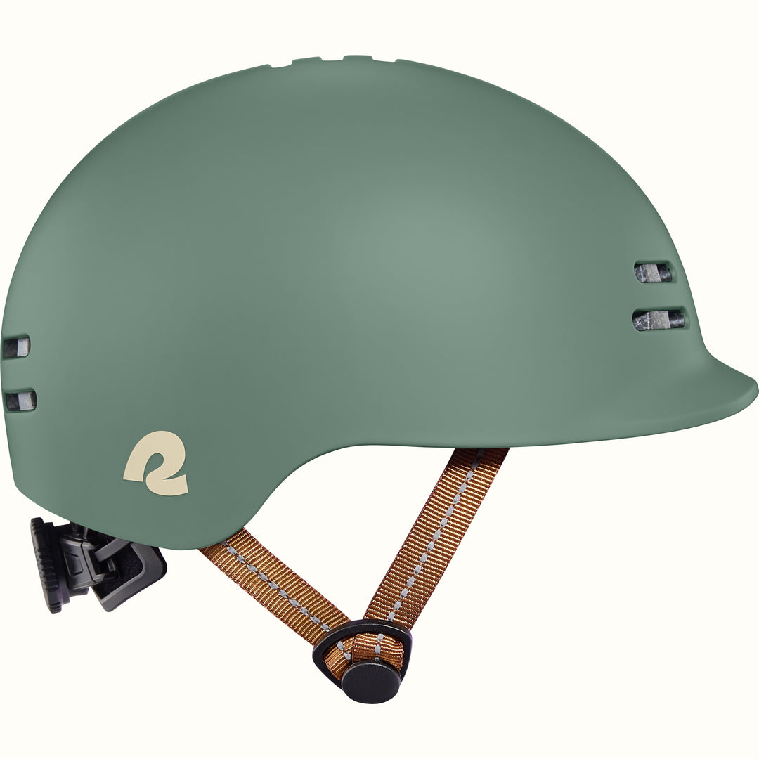 Green toddler bike helmet with a brown strap on a white background.