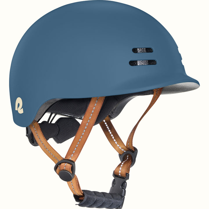 Blue toddler bike helmet with a brown strap on a white background.