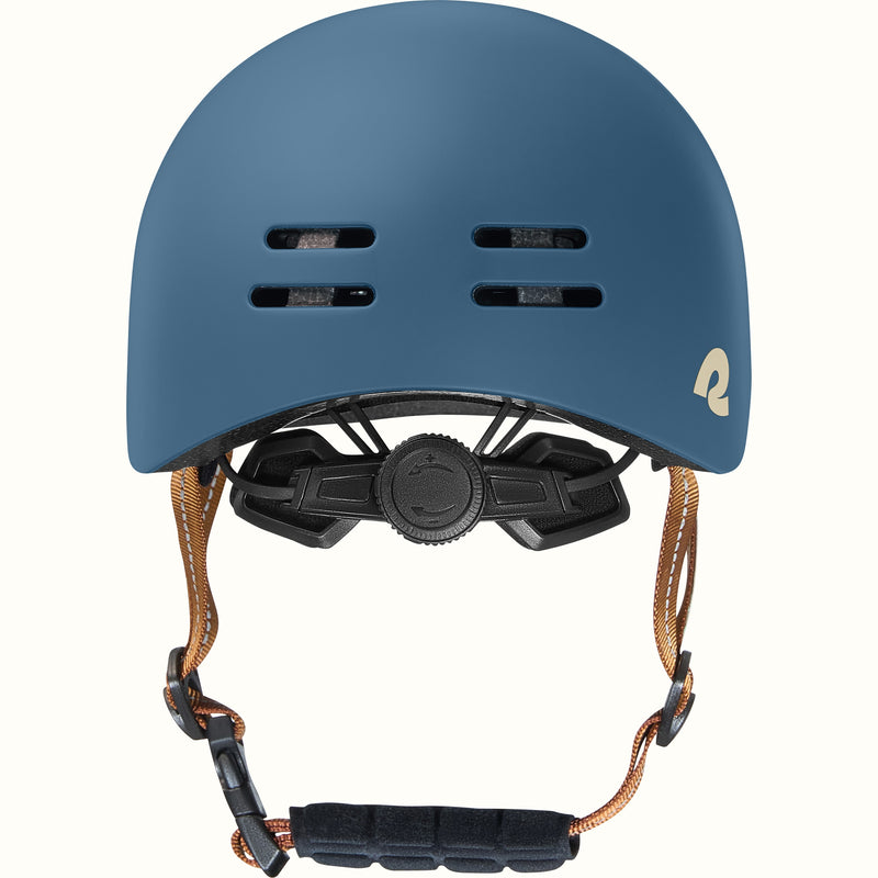 Blue toddler bike helmet with a brown strap on a white background.