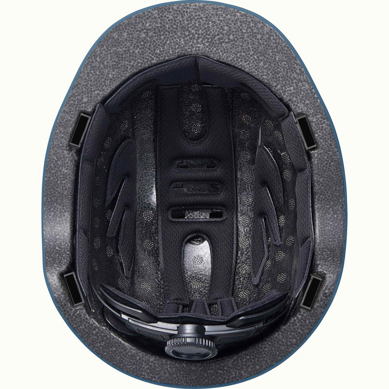 Close-up of the black interior of the Remi Toddler Bike Helmet revealing padding and an adjustable dial.
