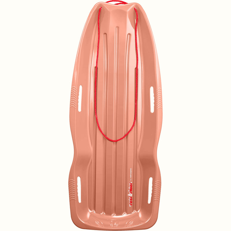 Retrorider Toboggan Snow Sled - 48” in Polar Pink with a red rope on a white background.