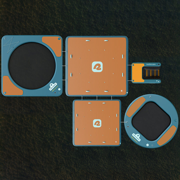 Aerial view of the Siesta floating platforms and hammocks on water, featuring circular and square sections with orange surfaces and interconnected design.