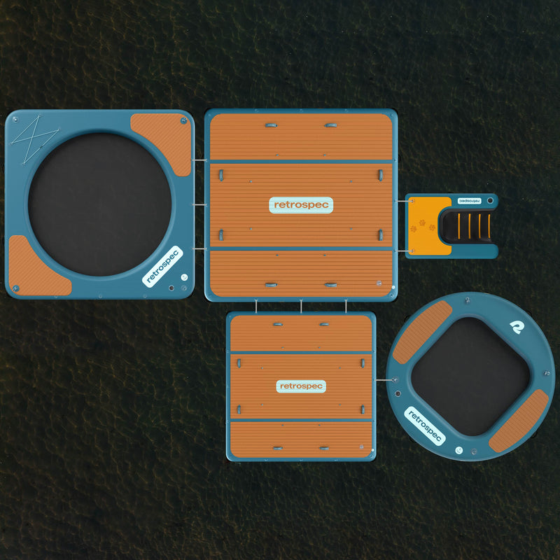 Aerial view of the Siesta floating platforms and hammocks on water, featuring circular and square sections with orange surfaces and interconnected design.