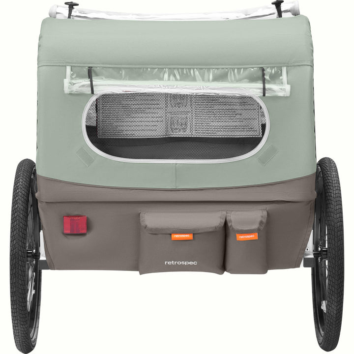 The rear of the Rover Plus Kids Bike Trailer - Double with a mesh rear window and cargo pockets.