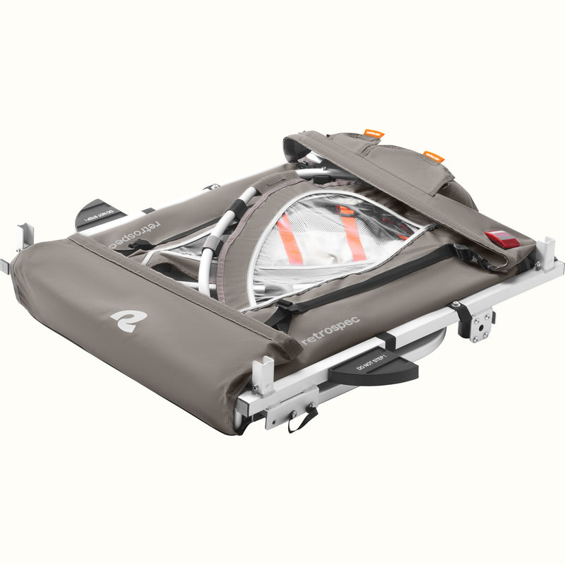 The Rover Plus Kids Bike Trailer - Double collapsed showing its compact storability. 