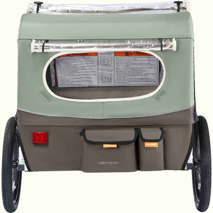 The rear of the Rover Plus Kids Bike Trailer - Double with a mesh rear window and cargo pockets.