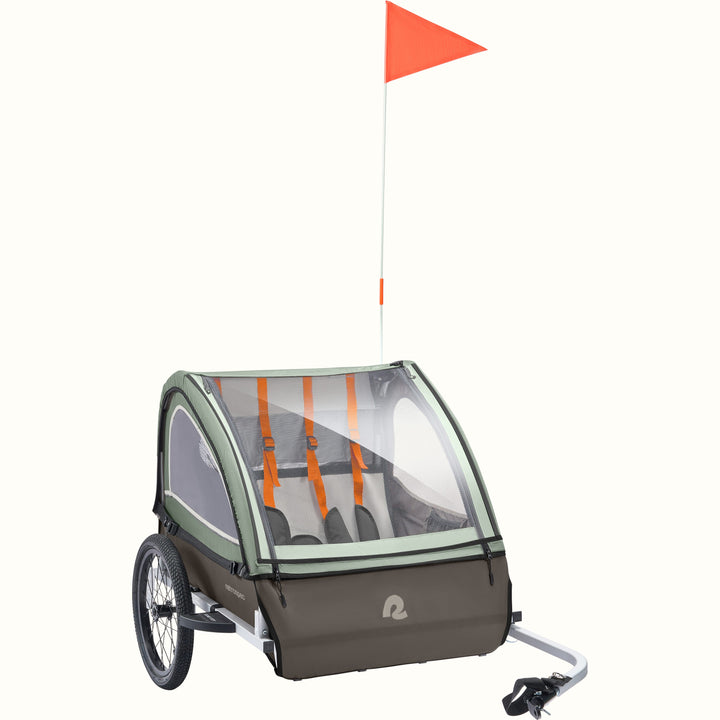 Child bike trailer with a red flag on a white background.