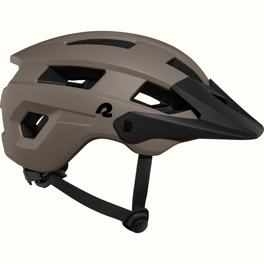 A sleek, modern mountain bike helmet in iron gray with ventilation slots and a black visor, designed for safety and style.