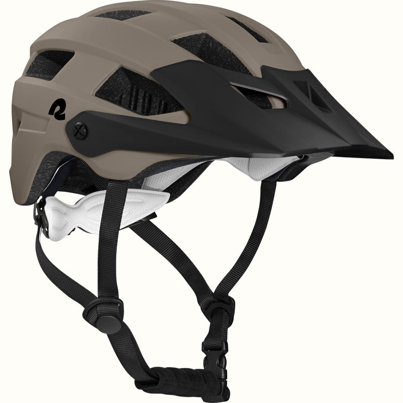 A sleek, modern Rowan Youth mountain bike helmet in gray with ventilation slots, adjustable chin strap, and a black visor, designed for safety and style.