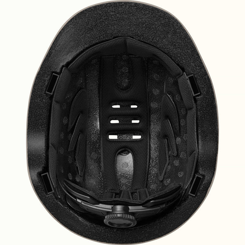 Interior view of the Rowan Youth Mountain Bike Helmet, showing padding, ventilation holes, and an ergoknob dial to adjust fit.